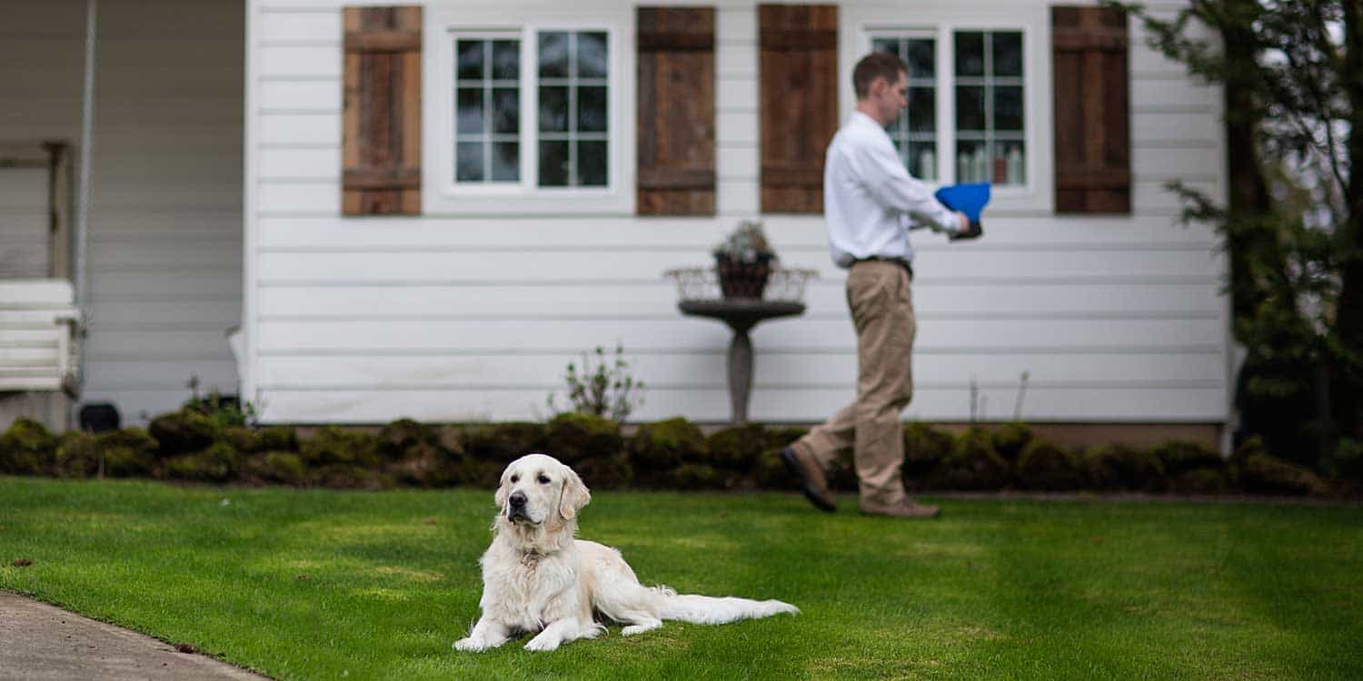 A photo of a lawn in Vancouver, WA being treated by an Aspen exterminator.